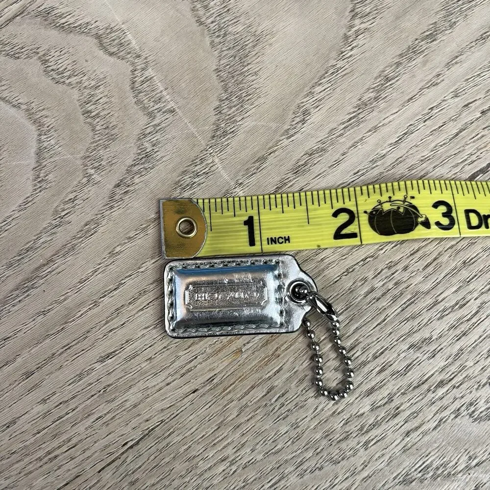 Coach hang tag